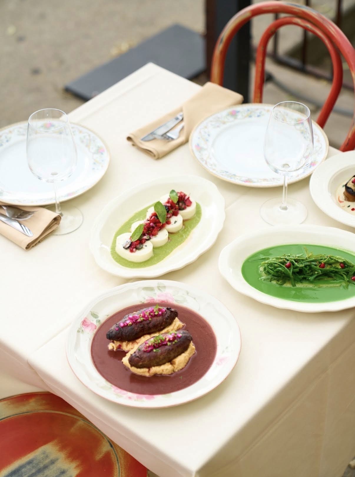 A table at Guda set with Georgian plates and glasses